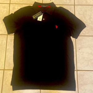 A Brand New US Polo Assn. Mens black shirt sleeve polo shirt. Size Medium